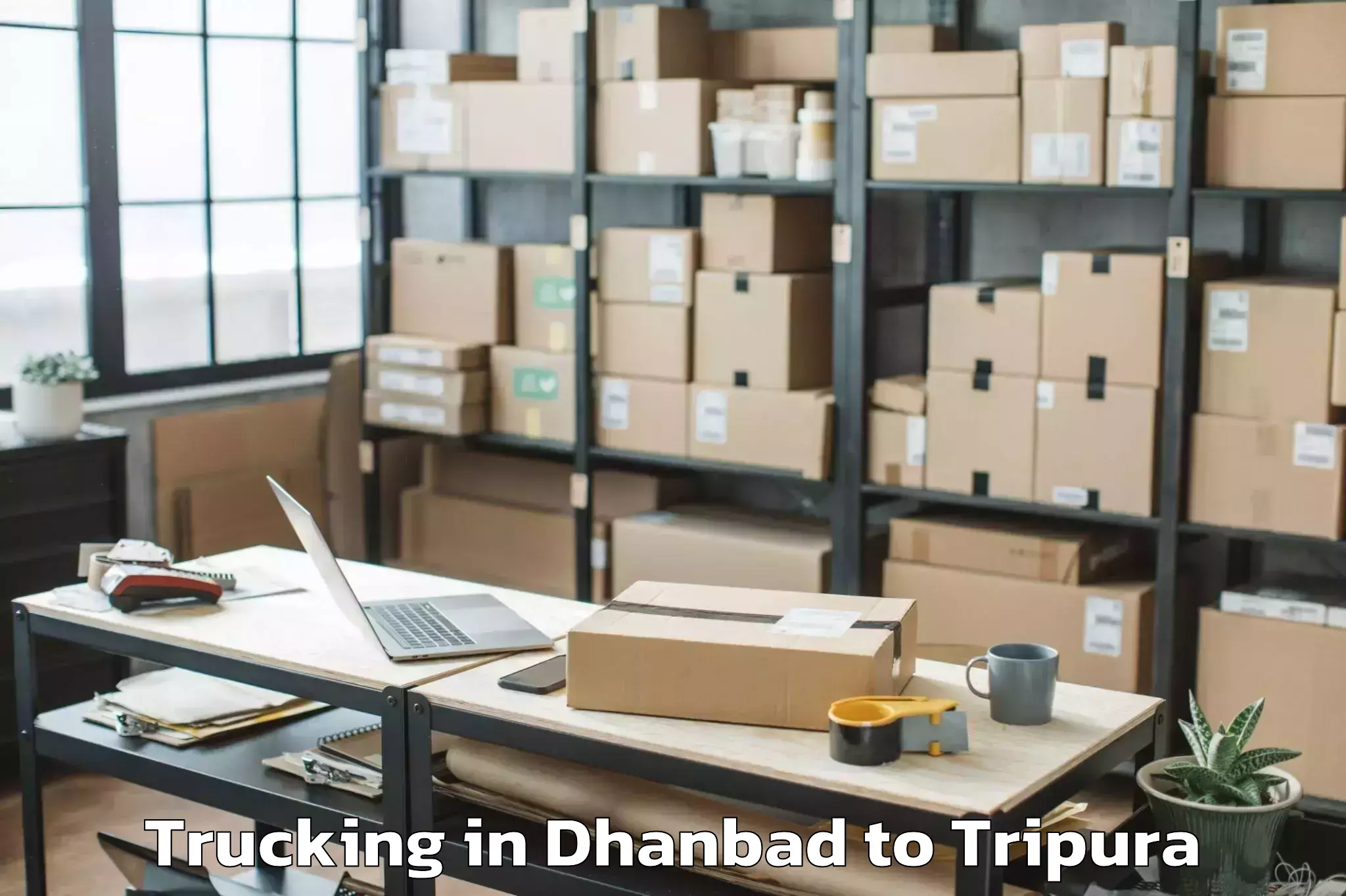 Dhanbad to Manughat Trucking Booking